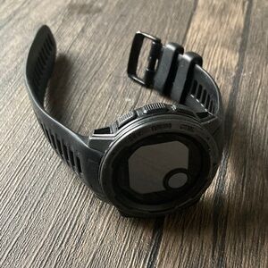 garmin black GPS sports smartwatch with black silicone band